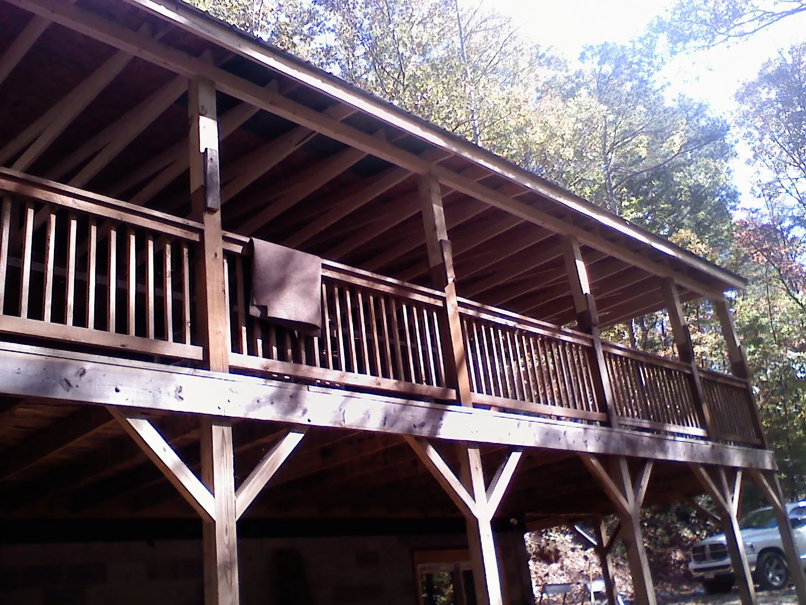 Timber framing under a new elevated porch and deck — Roof Leak Repair in Hingham by Roofing Brothers